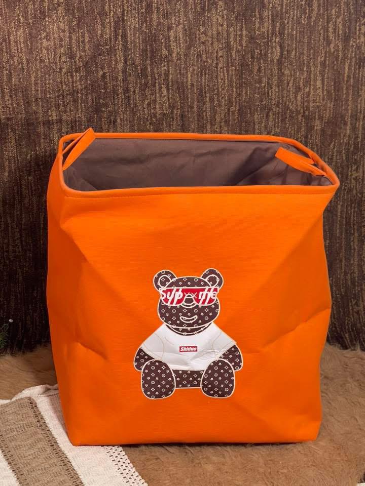 Panier à linge orangé Suprem